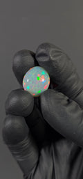 13.30 Carat Ethiopian Opal Cabochon – Honeycomb Pattern Red & Green Fire (17.82 × 15.57 × 11.10 mm)