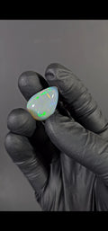 15.50 Carat Ethiopian Opal Cabochon – Honeycomb Pattern Multicolor Fire (24.24 × 17.08 × 8.61 mm)
