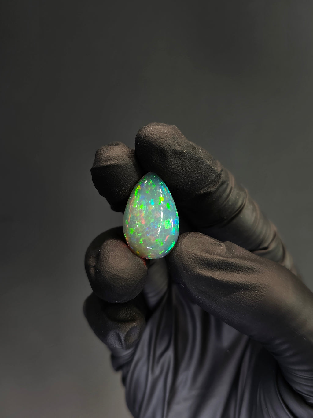 16ct Natural Ethiopian Welo Opal Cabochon – Pear Opal with Green & Red Fire (24.7 × 16 × 8.6 mm)
