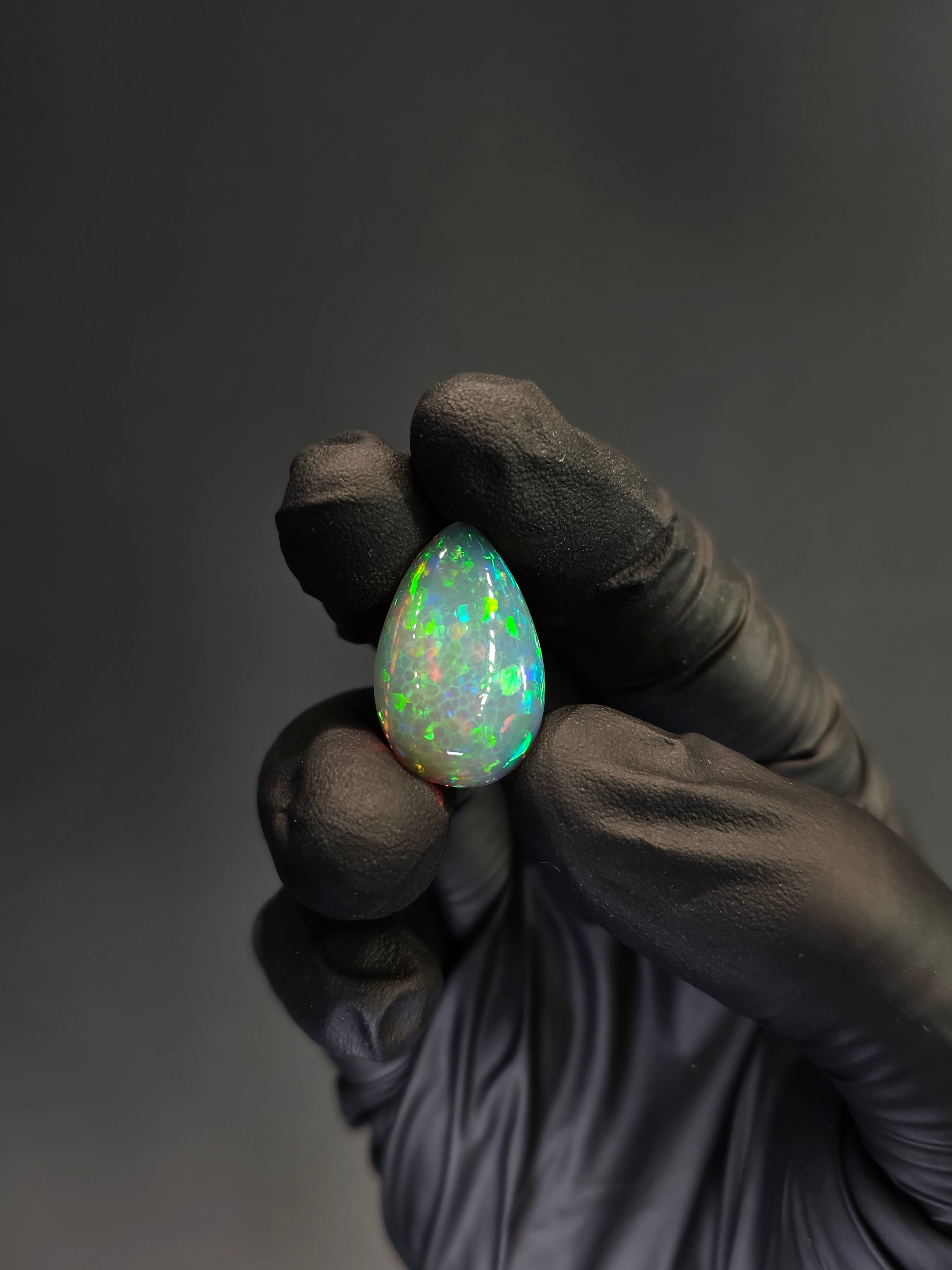 16ct Natural Ethiopian Welo Opal Cabochon – Pear Opal with Green & Red Fire (24.7 × 16 × 8.6 mm)