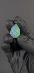 25 Carat Ethiopian Opal Cabochon – Honeycomb Pattern Multicolor Fire (26.74 × 19.18 × 10.49 mm)