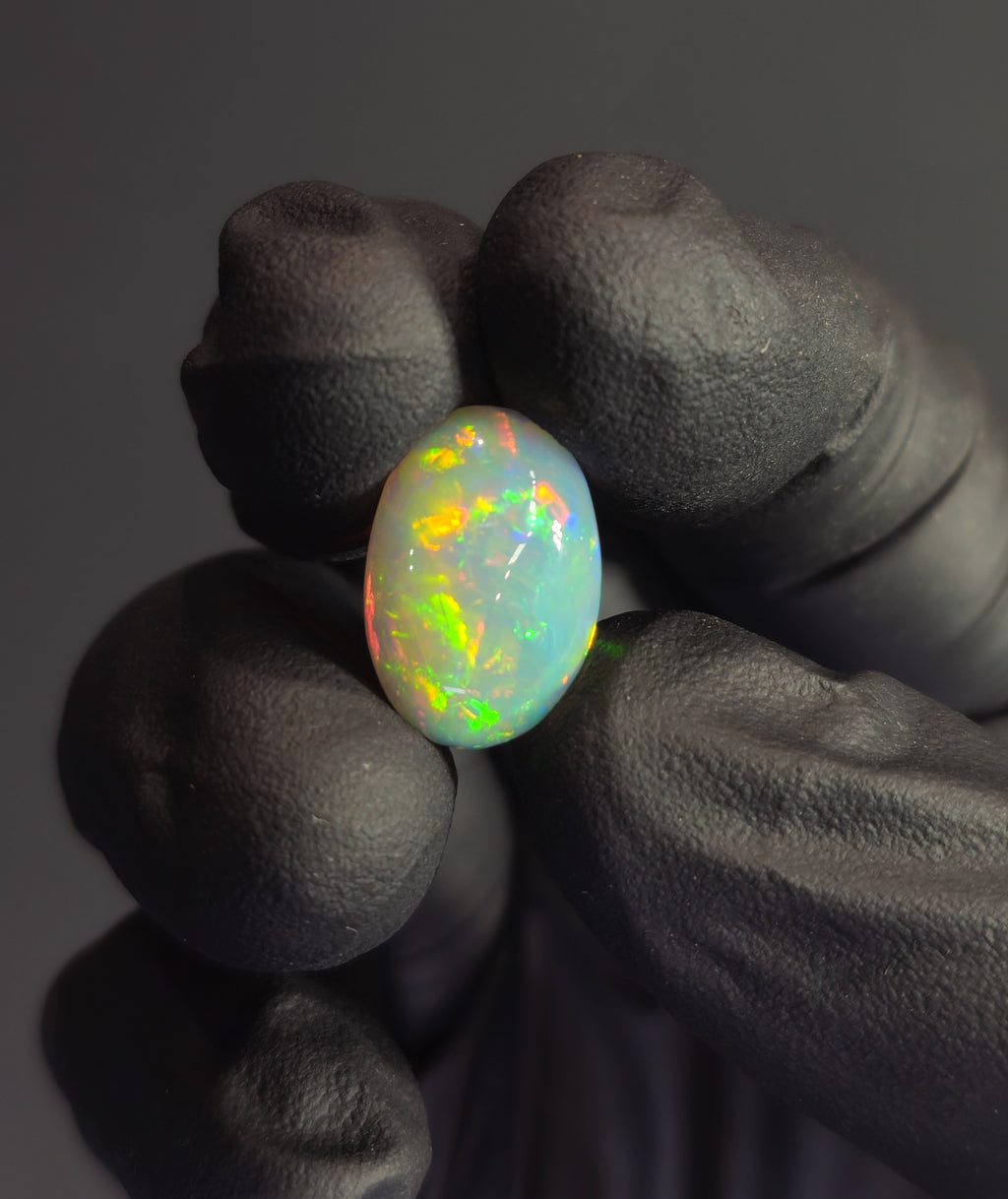 6.4 Carat Ethiopian Opal Cabochon – Bright Multicolor Fire (17.0 × 12 × 5.9 mm)