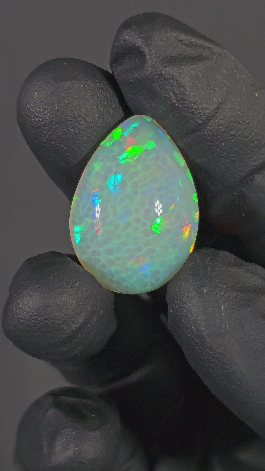 25 Carat Ethiopian Opal Cabochon – Honeycomb Pattern Multicolor Fire (26.74 × 19.18 × 10.49 mm)