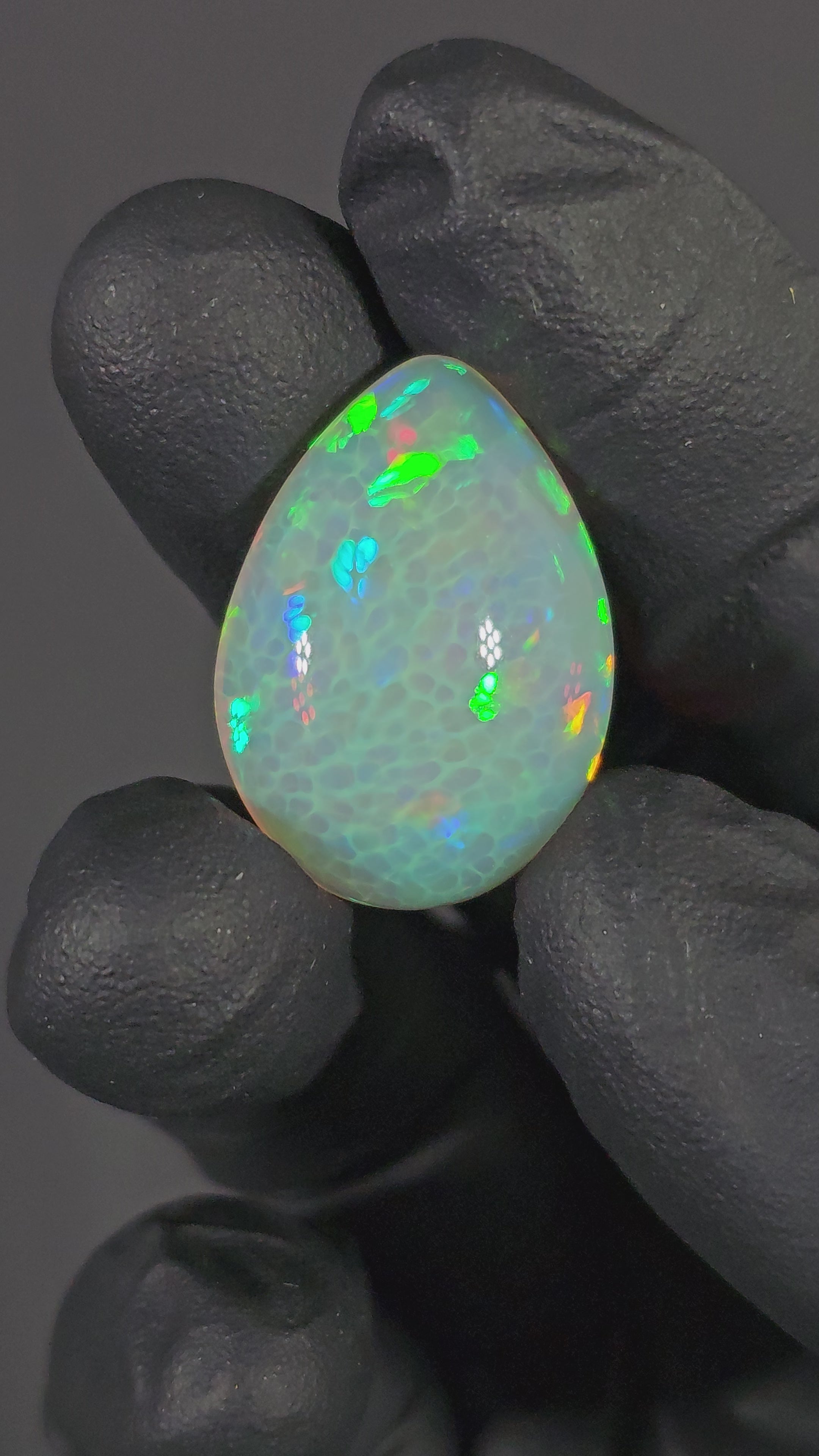 25 Carat Ethiopian Opal Cabochon – Honeycomb Pattern Multicolor Fire (26.74 × 19.18 × 10.49 mm)