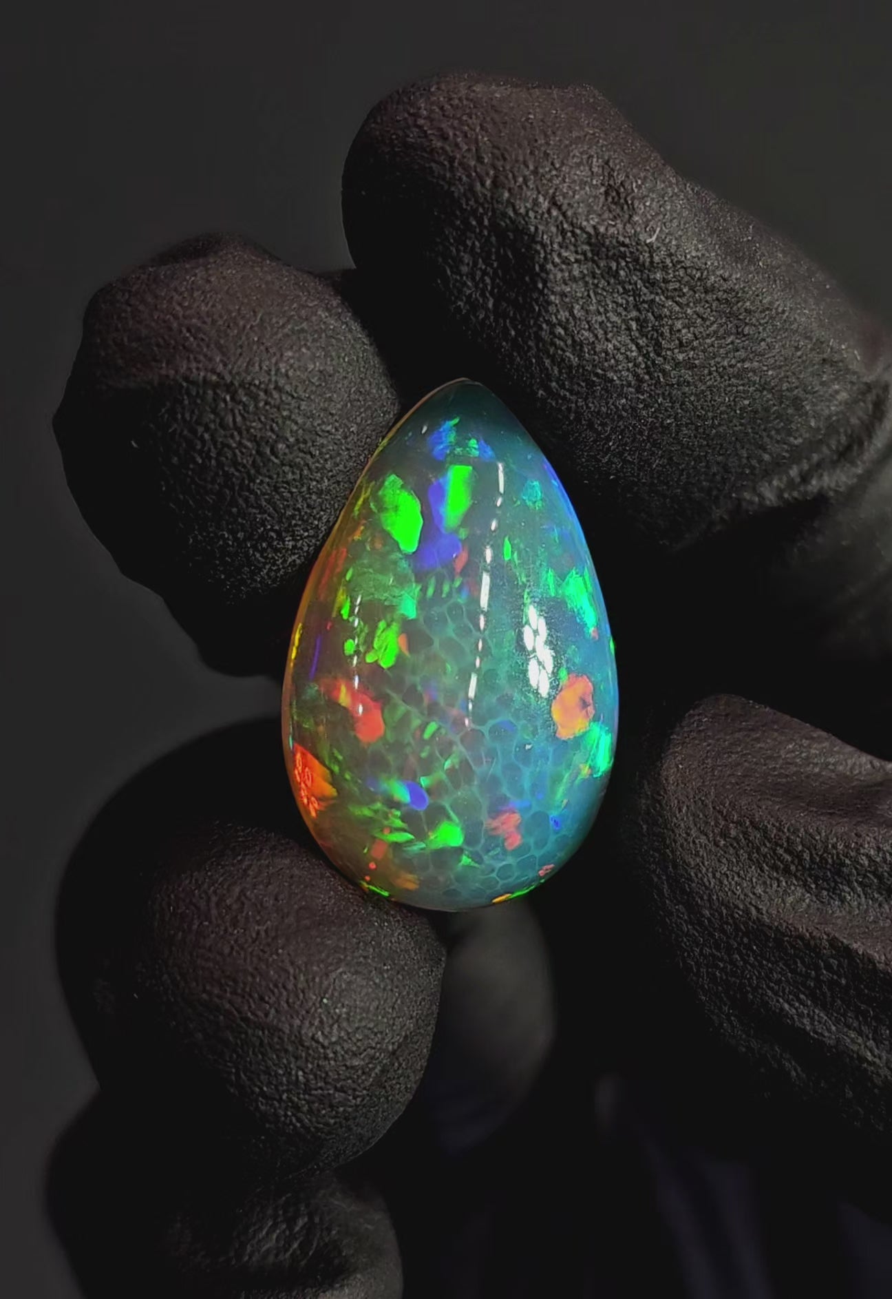16ct Natural Ethiopian Welo Opal Cabochon – Pear Opal with Green & Red Fire (24.7 × 16 × 8.6 mm)