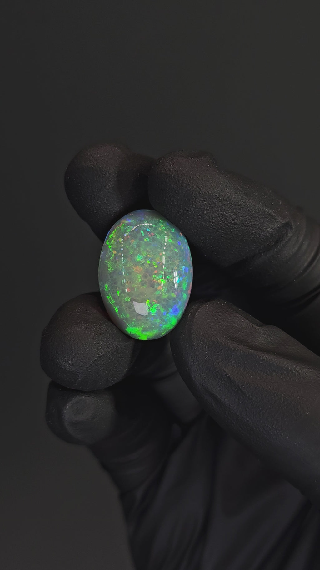 22.85 Carat Ethiopian Opal Cabochon – Bright Green Fire Natural Opal (24.33 × 17.38 × 10.14 mm)